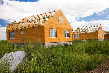 Image showing Building of the wooden house 