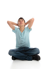 Image showing Thinking or troubled boy looking skyward