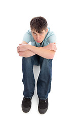 Image showing Sulky sullen unhappy boy