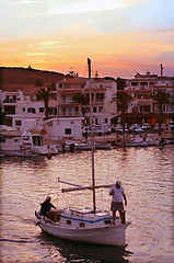 Image showing fisherman coming home