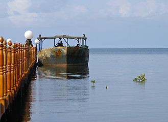 Image showing Old boat tied to a jetty in Cuba