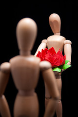 Image showing Mannequin giving Flower