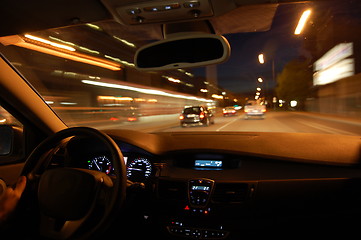 Image showing night drive with car in motion 