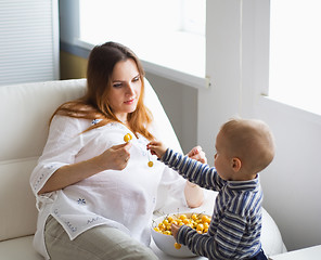 Image showing Pregnant mother and baby