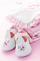 Image showing Pink baby clothes for infant girl