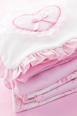 Image showing Pink baby clothes for infant girl