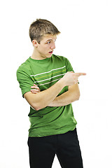 Image showing Young man pointing to the side