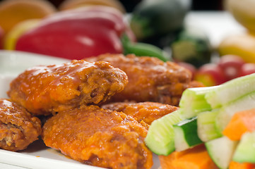 Image showing  buffalo chicken wings served with pinzimonio