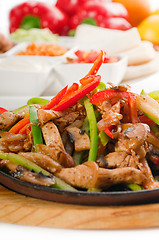 Image showing original fajita sizzling hot  on iron plate