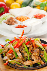 Image showing original fajita sizzling hot  on iron plate