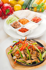 Image showing original fajita sizzling hot  on iron plate