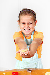 Image showing Child baking cookies