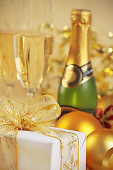 Image showing christmas gift and champagne