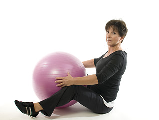 Image showing senior woman fitness exercise with core training ball