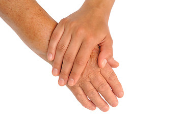 Image showing Hands of young and senior women - helping hand concept - clipping path included