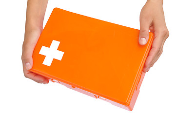 Image showing Hands of young woman holding first aid kit