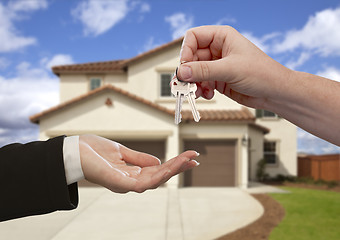 Image showing Handing Over the House Keys in Front of New Home