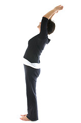 Image showing middle age senior woman mountain tadasana yoga back stretch posi