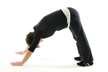 Image showing middle age senior woman downward facing dog yoga position