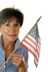 Image showing middle age senior woman patriotic with American flag