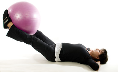 Image showing middle age senior woman exercise with core training ball