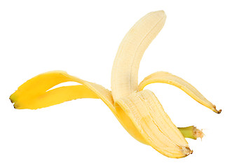 Image showing Single yellow banana and peel