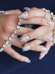 Image showing decorated nails with jewelry