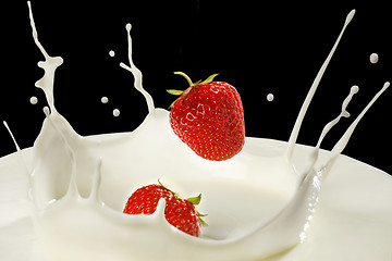 Image showing strawberries and milk splash