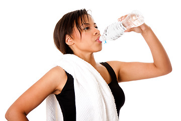 Image showing Rehydrating drinking water after workout