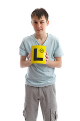 Image showing Teenager holding L plates