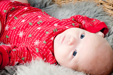 Image showing Little cute baby in red