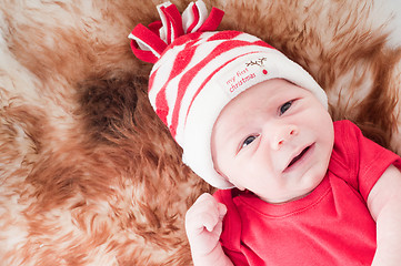 Image showing Newborn baby in chritstmas hat