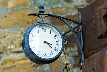 Image showing Old metal round clock