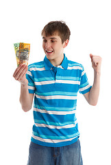 Image showing Teenage boy holding money