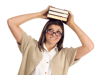 Image showing Ethnic Student with Books on Her Head Over White