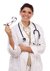 Image showing Pretty Smiling Ethnic Female Doctor or Nurse on White