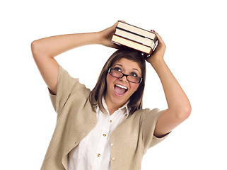 Image showing Ethnic Student with Books on Her Head Over White