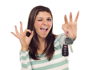 Image showing Ethnic Female with Car Keys and Okay Hand Sign on White