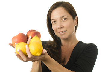 Image showing attractive woman with peaches fresh fruit