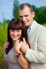 Image showing happy enamoured couple embracing