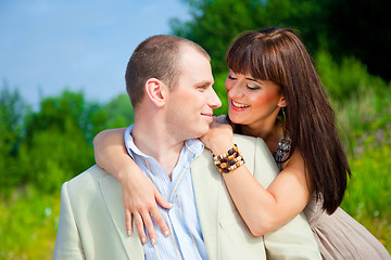 Image showing happy enamoured couple embracing