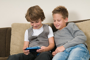 Image showing Two friends on a computergame