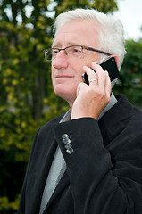 Image showing Businessman using a smartphone