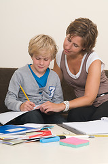 Image showing Doing homework with mother