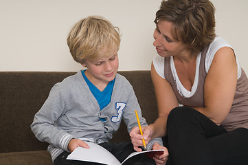 Image showing Doing homework with mother