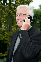 Image showing Businessman using a smartphone