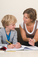 Image showing Doing homework with mother