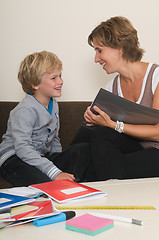 Image showing Doing homework with mother