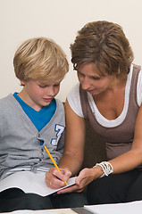 Image showing Doing homework with mother