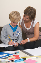 Image showing Doing homework with mother